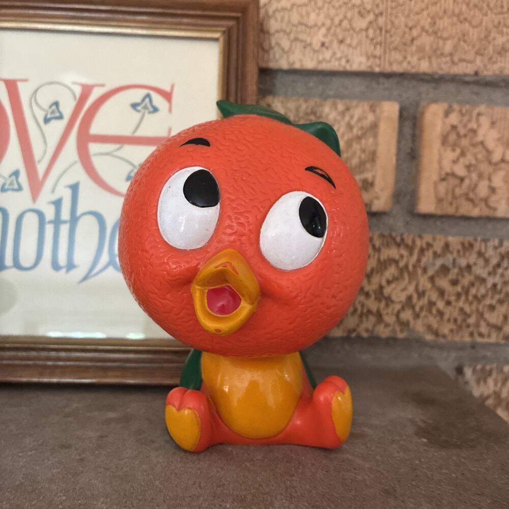 Vintage Disney Florida Little Orange Bird Figure Coin Bank Toy